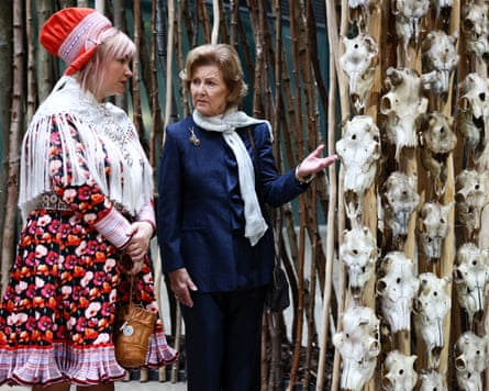 An installation that would suit a hotel lobby … the artist and Queen Sonja of Norway with the reindeer skulls.