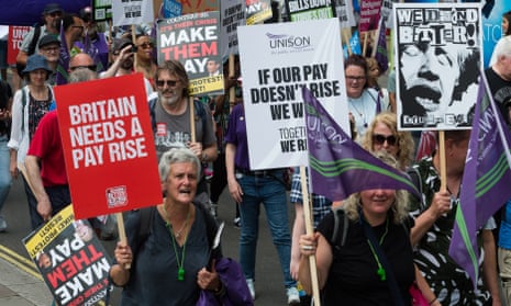 People march in protest at the government's handling of the cost of living crisis and to demand a better deal for working people, in London last month