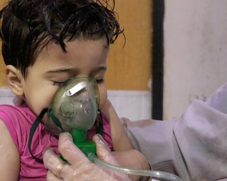Victims of alleged gas attack in Eastern Ghouta<br>DAMASCUS, SYRIA - APRIL 08: An affected Syrian kid receives medical treatment after Assad regime forces allegedly conducted poisonous gas attack to Duma town of Eastern Ghouta in Damascus, Syria on April 08, 2018. At least 78 civilians dead, including women and children, according to the initial findings. (Photo by Mouneb Taim/Anadolu Agency/Getty Images)