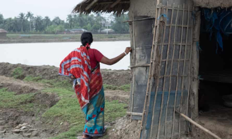 A farmer outside her home in Bangladesh
