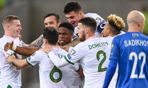 Republic of Ireland players celebrate after their third goal, scored by Chiedozie Ogbene, centre.
