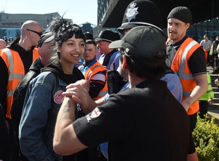 Saffiyah Khan, in a Specials T-shirt, staring down English Defence League protester Ian Crossland in Birmingham, April 2017.