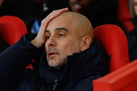 Pep Guardiola shows frustration on the sidelines.