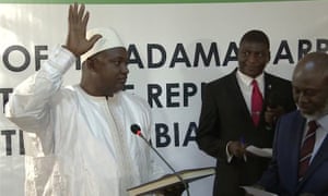 Adama Barrow is sworn in as president of the Gambia at the country’s embassy in Dakar, Senegal.