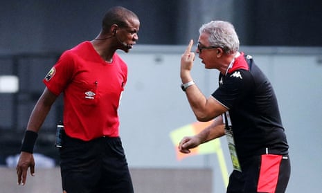 Tunisia’s coach Mondher Kebaier remonstrates with the referee Janny Sikazwe at Africa Cup of Nations after he ended the match too early.