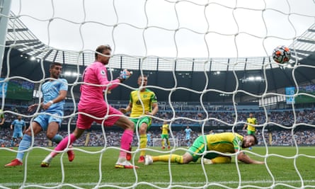Tim Krul watches the ball cross the line.