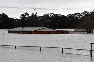Residential properties and roads are submerged under flood waters from the Hawkesbury River, in Cattai