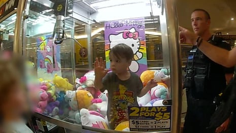 Three-year-old rescued from Hello Kitty claw machine in Brisbane – video
