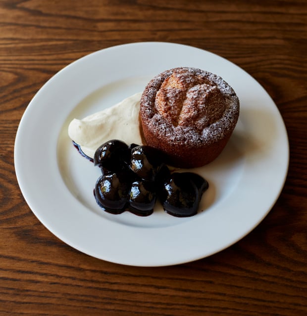 The Baring’s ‘large, freshly made warm almond financier served with luscious cherries and a pile of thick cream’.