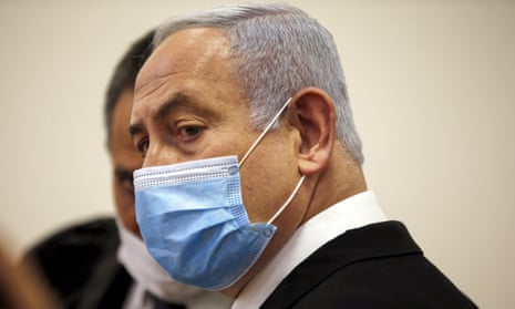 Benjamin Netanyahu enters court for the start of his trial