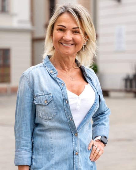 Zsuzsi smiles as she poses in the street
