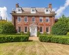 Homes for sale with impressive entrances in England and Scotland – in pictures