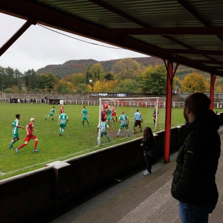 The home fans watch their team attack in the 7-0 victory during the Ton Pentre v Merthyr Saints South Wales Alliance League match at Ynys Park, Ton Pentre on October 22nd 2022 in the Rhondda Valleys, South Wales.