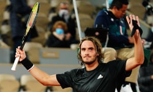 Stefanos Tsitsipas celebrates winning his match.