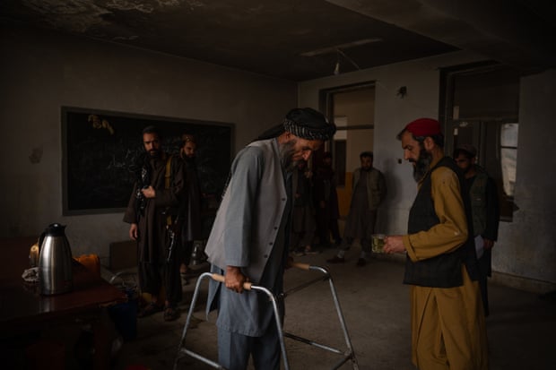 Mawli Jannat Gul, who was injured by a mine during the American war in Afghanistan, has come to apply for aid at the district governor’s compound in Jalrez.