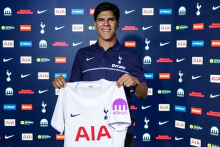 Mateus Fernandes holds up his Tottenham shirt after completing his transfer