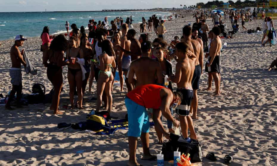 Revelers flock to the beach to celebrate spring break, amid the Covid-19 outbreak, in Miami Beach, Florida, last week.