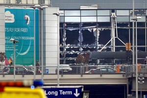 Broken windows seen at the scene of explosions at Zaventem airport
