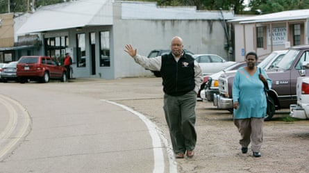 a man walking with a woman