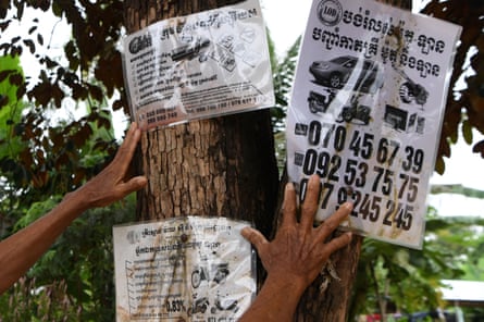 Flyers for lending services in a village in Siem Reap province.