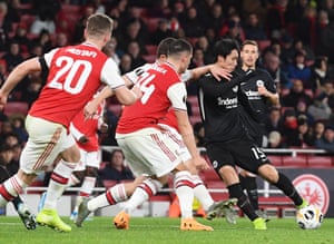 Daichi Kamada (right) of Frankfurt scores their equaliser.