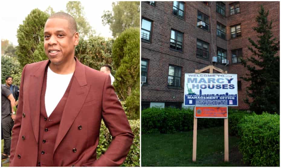Jay-Z and a sign in front of Marcy Houses where he grew up.