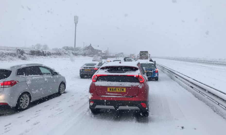 Cars stuck in the snow on the A30. 