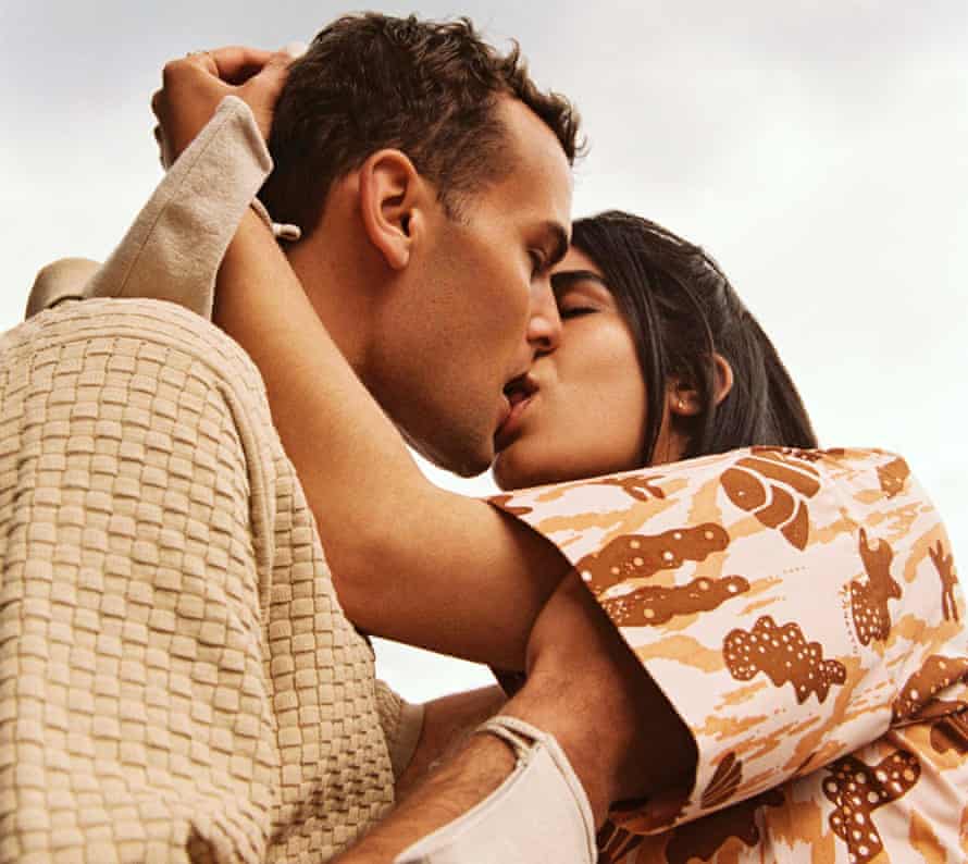 Head shot of couple Jordan Derrien (27) and Rosaline Shahnavaz (30) kissing, May 2021