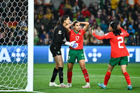 Hanane Ait El Haj of Morocco (C) reacts after scoring an own goal.