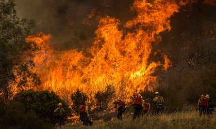 Firefighters battle the MocFire near Mocassin, California.