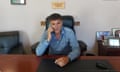 Lefteris Papakaloudoukas on the phone in his office
