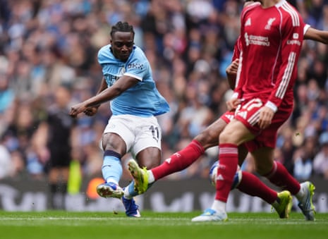 Jeremy Doku with an early effort on goal.