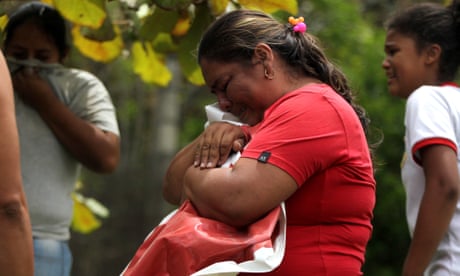 Locals in Suarez mourn the death of Karina García. The string of political killings has shaken the country.