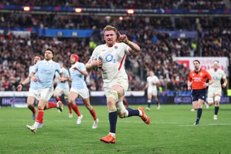Chessum celebrates as he runs in to score England's fifth try.