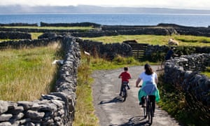 A mother and son bike around Inis Oirr Island
