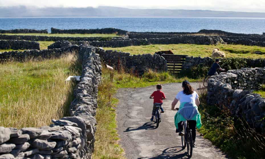 A mother and son bike around Inis Oirr Island