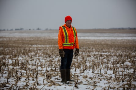 Neil Shaffer posed in the barren fields he used to farm in Cresco, Iowa on Thursday, December 12th. Photo by Jordan Gale