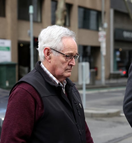 Ian Wilkinson (L) leaves court after the first day of the appeal hearing in Melbourne on 19 August.