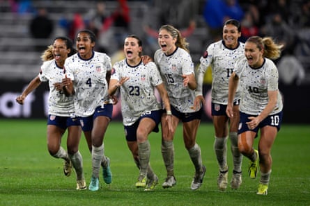 USWNT players celebrate after defeating Canada in Wednesday’s game.