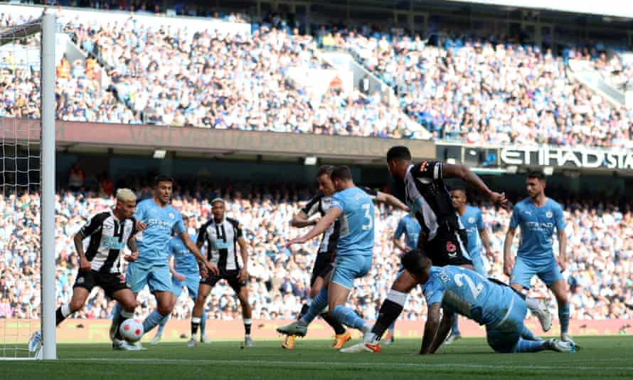 Newcastle United’s Chris Wood scores their first goal before it is disallowed.