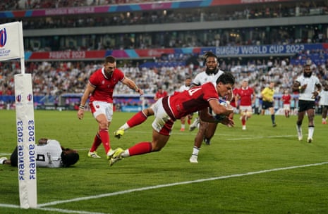 Wales' Louis Rees-Zammit scores their side's third try.