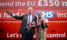 Boris Johnson standing in front of the Vote Leave bus during the EU referendum campaign with a fellow campaigner