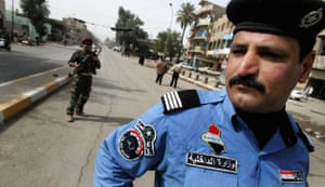 Baghdad, Iraq: Soliders and police close down the streets