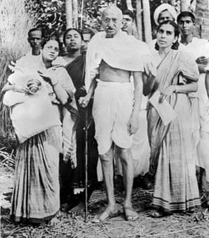 Gandhi poses during his tour of Bengal province