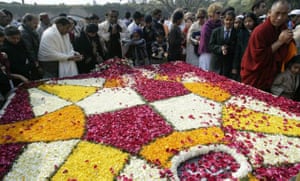 People pay floral tribute at the memorial of Mahatma Gandhi