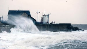 Porthcawl, south Wales: Waves batter the harbour wall