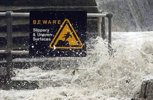 Lyme Regis, Dorset: A warning sign at high tide