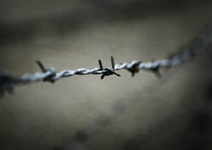 Barbed wire surrounds the Nazi Concentration Camp of Aushwitz