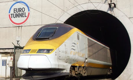 A Eurostar train emerges from the Eurotunnel
