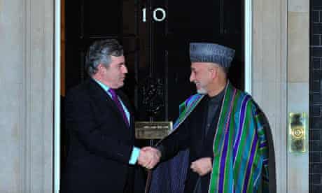 Gordon Brown greets Afghan president Hamid Karzai ahead of a meeting in 10 Downing Street
